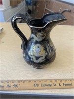 Oriental pitcher