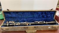 Vintage clarinet with lined carrying case.  (833)