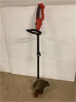 B&D 20 volt weed trimmer. No battery or charger