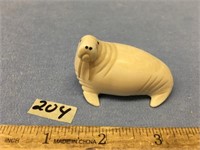 2 1/4" x 1 1/2" vintage carving of a walrus, inset
