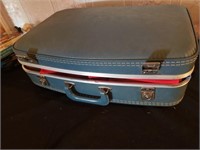 Vintage suitcase w/ material