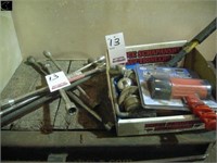 Assortment of tire wrenches, trailer balls