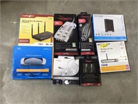 (R) Box Lot Of Wires, Extension Cords, And WiFi