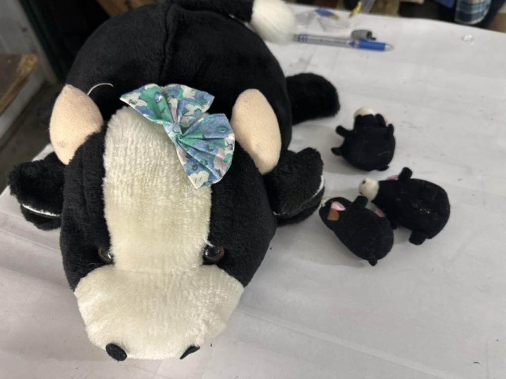 Cow with baby cows inside plush