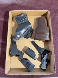 Flat of holsters and magazine loaders