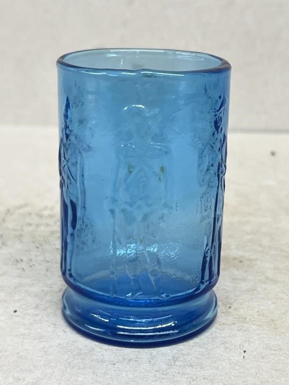Soldier embossed blue glass