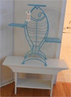 Teal blue figural wire fish rack and white end