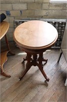 Oval top wood Eastlake end table