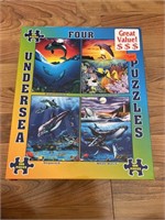 C4)  Puzzles-4 pack, 500 pieces each