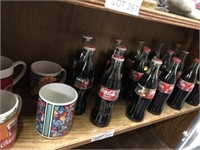 1999 Coca Cola Bottles & Mugs