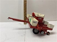 Metal & plastic corn planter