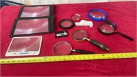 Magnifying Glasses, one brass wooden handle