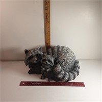 Raccoon garden statue