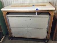 Homemade rolling file cabinet with countertop.