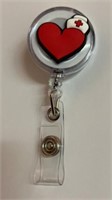New Red Cross heart badge reel
