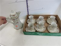 Cocoa pot and 6 - cups and saucers