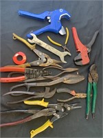 Assortment of pipe cutters, needle nose pliers,