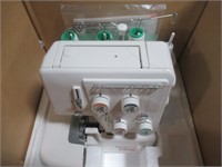 Janome model 134D sewing machine in box. Appears