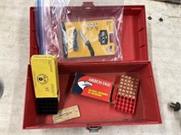 Tool box, empty shells and knife
