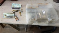 Tackle box with fishing gear inside