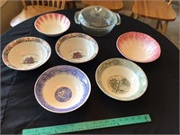 Several bowls and covered clear bowl