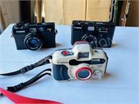 3 Canon 35mm cameras