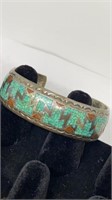 Turquoise inlaid cuff marked DJN