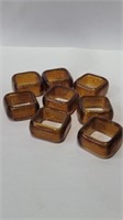 8 amber art  glass napkin rings