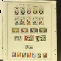 Togo & Tunisia Stamps on MInkus pages, mostly mid-