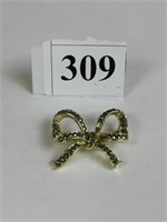 LISNER BOW PIN WITH SILVER STONES
