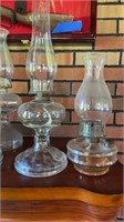2 Clear Glass Oil Lamps, 1 With Oil.