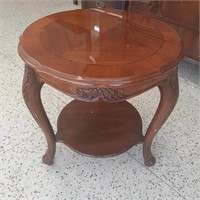 Three footed open side wood end table