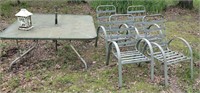 Metal w/Glass Top + 6 Chairs OUTDOORS!!  Great!