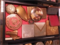 Container of vintage compacts including mirrors,