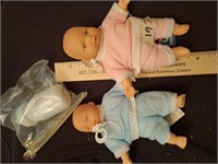 3 vintage softbody dolls with pacifiers