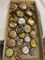 Gold colored pocket watch cases