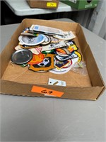 Box of patches and stickers