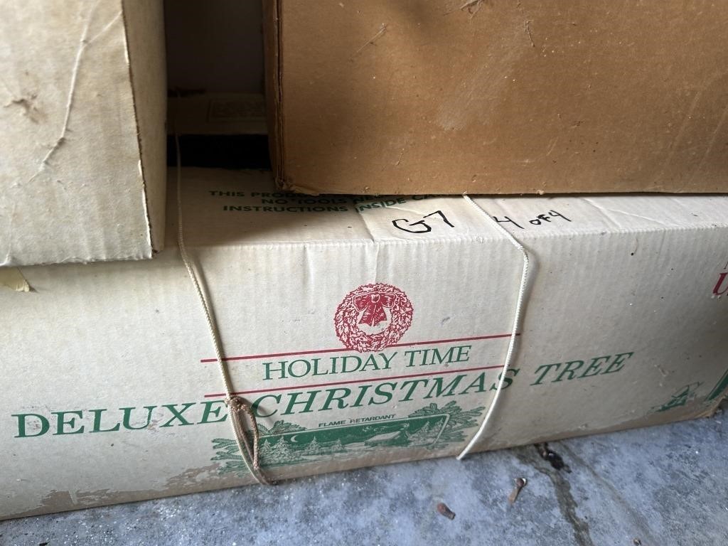 Four Boxes of Christmas Decorations   G7