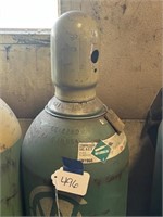 Empty Bottle of NOS Compressed Gas