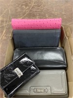 Lot of wallets and perfume bottle