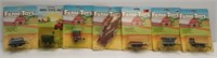 (7) Various farm toys by Ertl 1:64 scale.