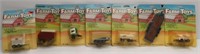 (7) Various farm toys by Ertl 1:64 scale.