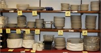 All the Platinum banded china dishes on shelves