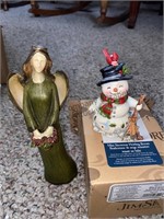 Risen angel and a Jim shore mini snowman