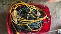 Collection of Extension Cords in a Large Tote