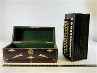 Vintage button concertina accordion