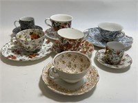 SEVEN VINTAGE TEACUPS AND SAUCERS