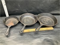 3 cast iron pans