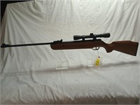 Pellet rifle with scope
