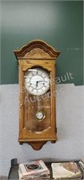 Howard Miller Oak pendulum wind-up wall clock,